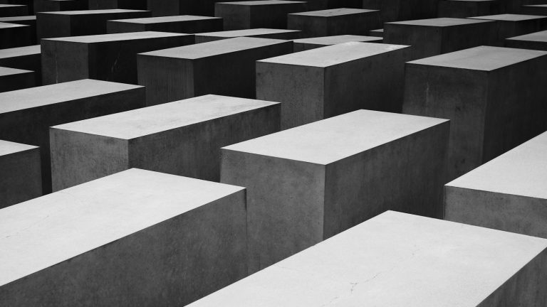 Gray concrete blocks stacked in rows