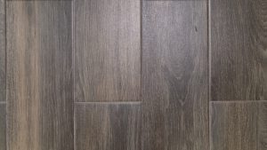 Close up of dark wooden floorboards