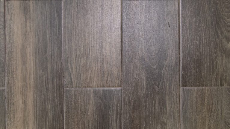 Close up of dark wooden floorboards