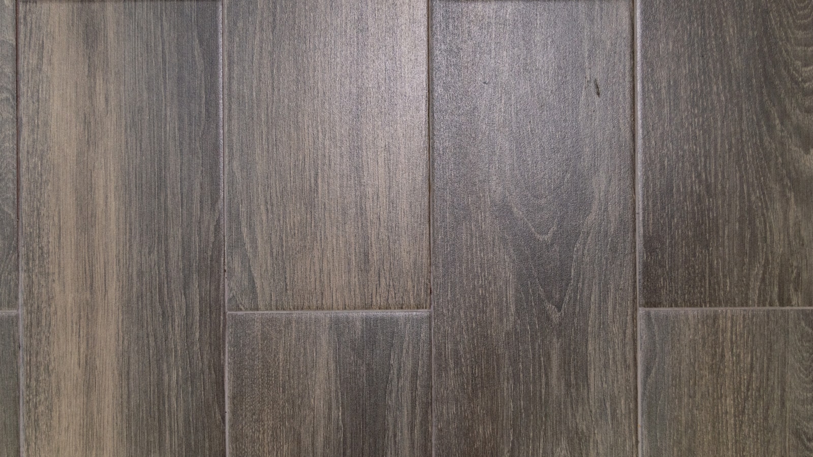 Close up of dark wooden floorboards